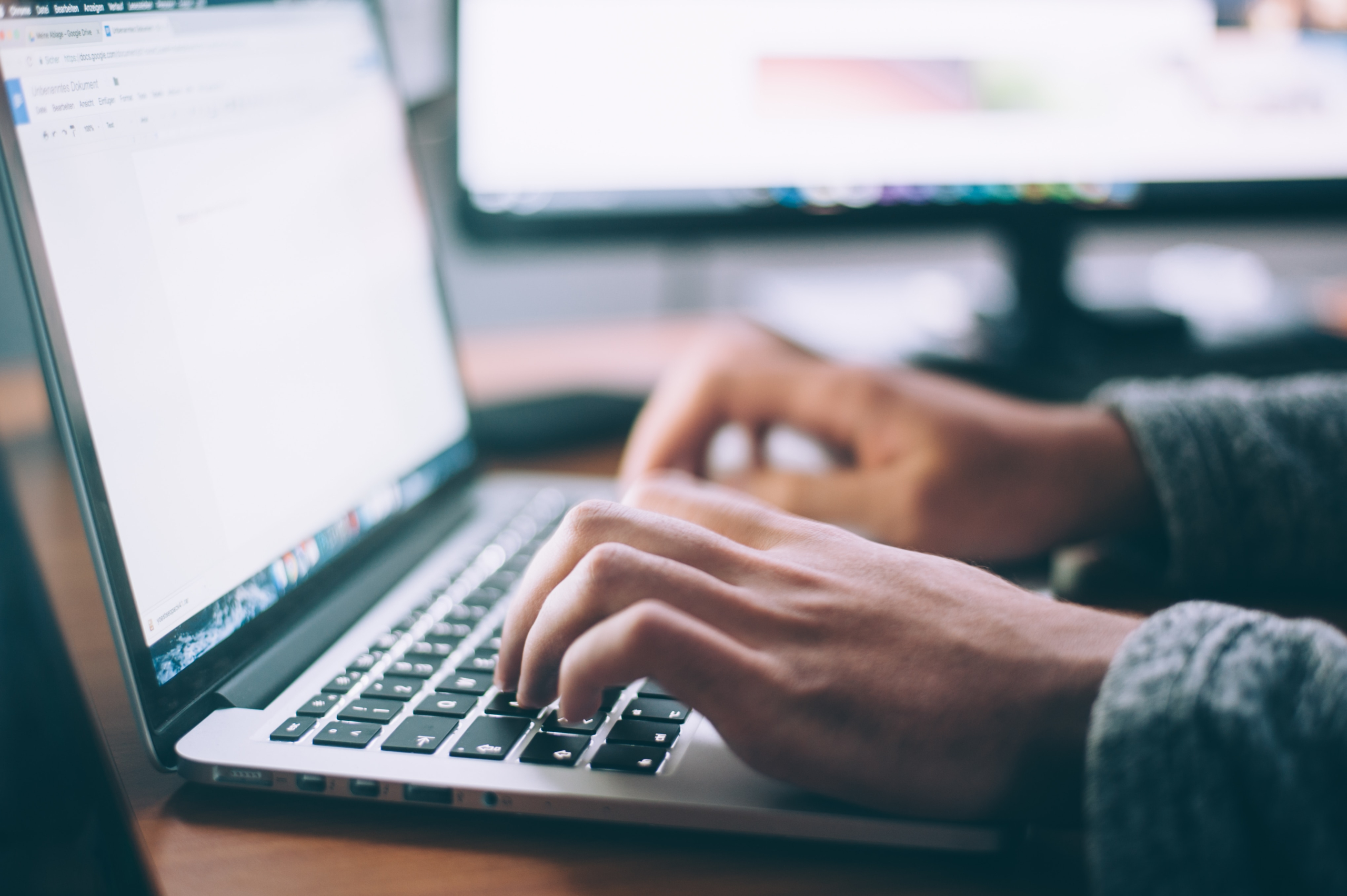 People can have different forms of dyslexia including difficulties with spelling or writing. To highlight this, a pair of hands are typing on a keyboard